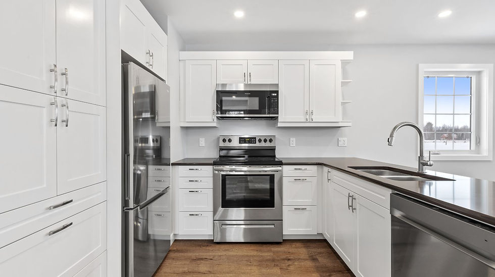 Humble Creek Construction custom kitchen cabinet detail showing white shaker deep pull out storage drawers