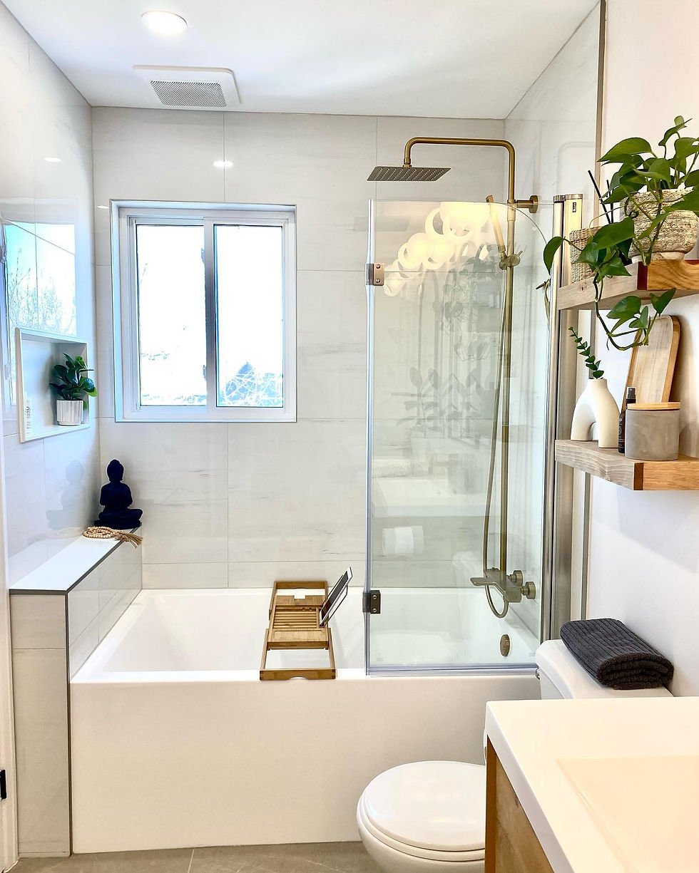 After Modern bathroom renovation with custom vanity and fixtures.”