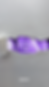 tear showing purple background with text