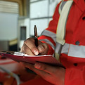 side-view-man-taking-notes-ambulance-car.jpg