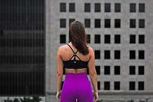 Fit Girl Standing on Roof