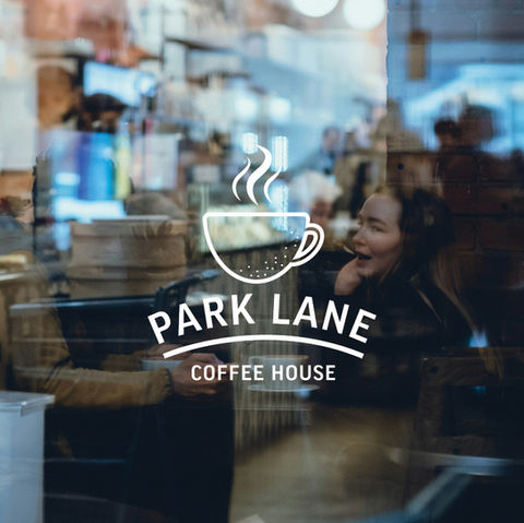 Window decal designed for Park Lane Coffee House featuring the logo and branding elements, with a cozy and inviting coffee shop atmosphere