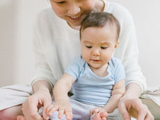 mother and baby playing
