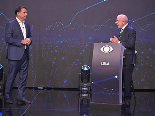 Lula e Flávio Bolsonaro travam debate tenso na Band marcado por acusações cruzadas e susto com suspeita de bomba