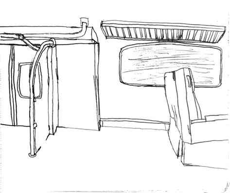 Graphite observational drawing of an interior workspace with furniture and architectural elements.