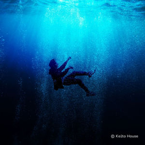 man sinking into deep waters