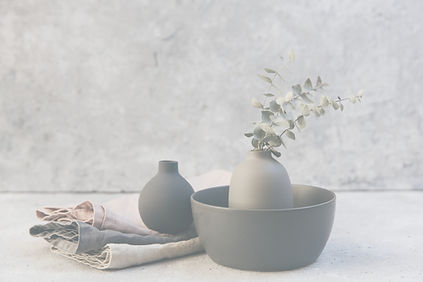 Clay pottery with table linens_edited.jpg