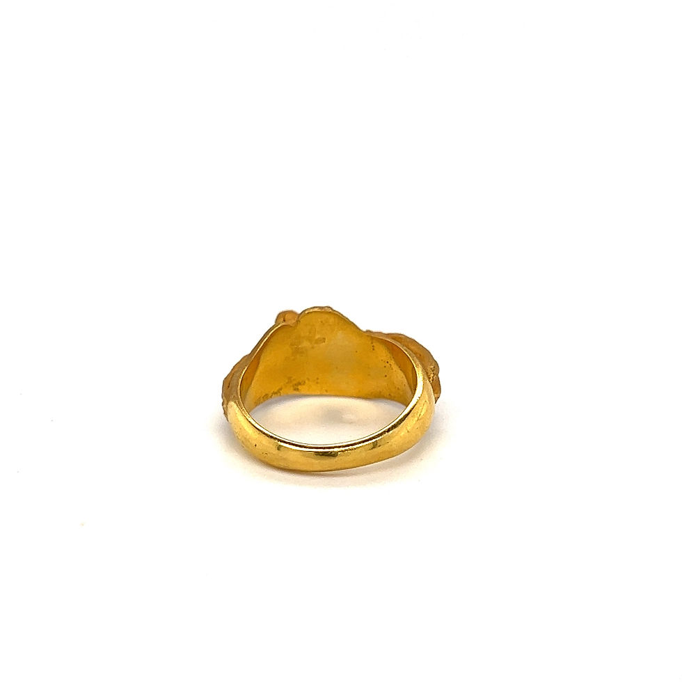 Thumbnail: Lady reading a book . 18ct yellow gold 