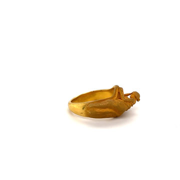 Thumbnail: Lady reading a book . 18ct yellow gold 