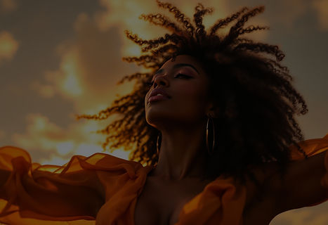 Black woman embracing freedom at sunset