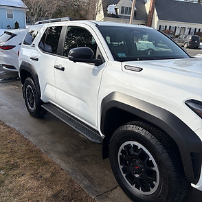 The cleaned exterior of a white SUV