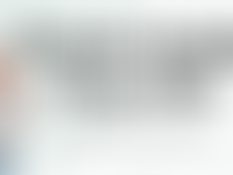 “Person listening to music with headphones, practicing English every day.”