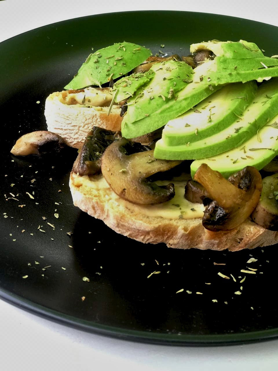 Sliced Avocado and Mushroom on Sourdough Toast