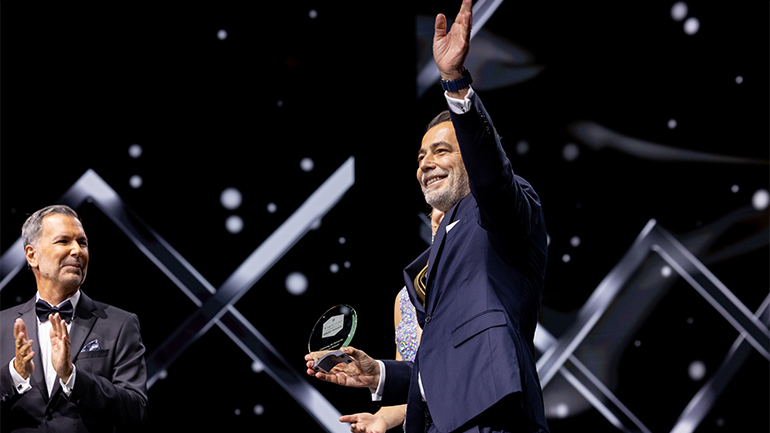 Regent Hong Kong General Manager Michel Chertouh receiving the award for Best Brand Hotel