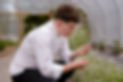 Award winning chef owner Calum Montgomery in Edinbane Lodge polytunnel