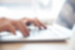 close-up-male-hands-typing-laptop-keyboa