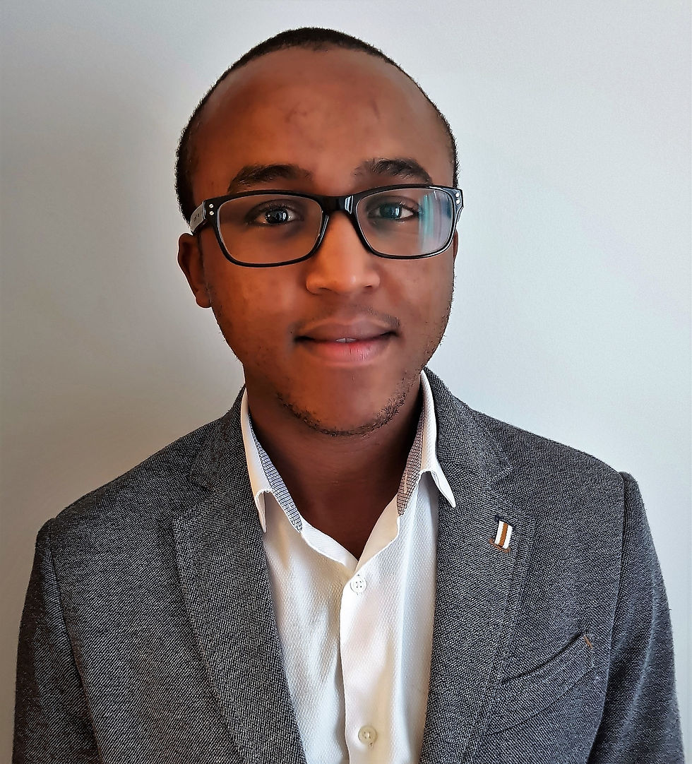 Head and shoulders photo of the lead author Paul Nderitu smiling