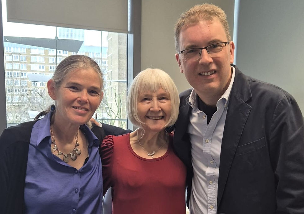 Colour photo of Elaine Manna (centre) with Daphne Koller (left) and Pearse Keane (right)