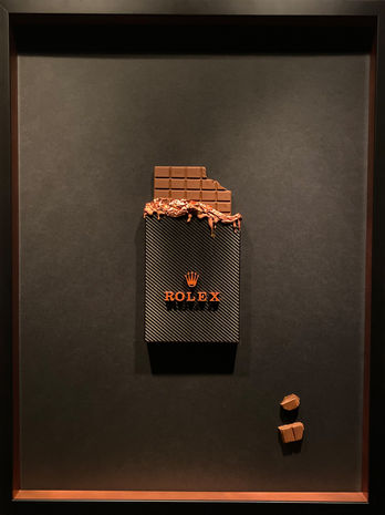 Schokolade als collage I rolex Schrift auf Wandbild I kunst I Wandbild I anne weigert art