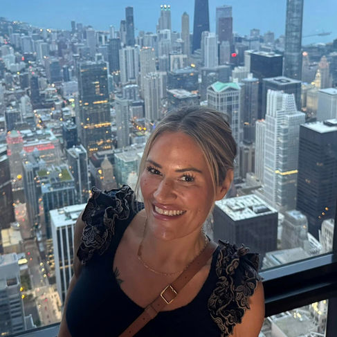Mara, happy, healthy & smiling on the Skydeck in Chicago.