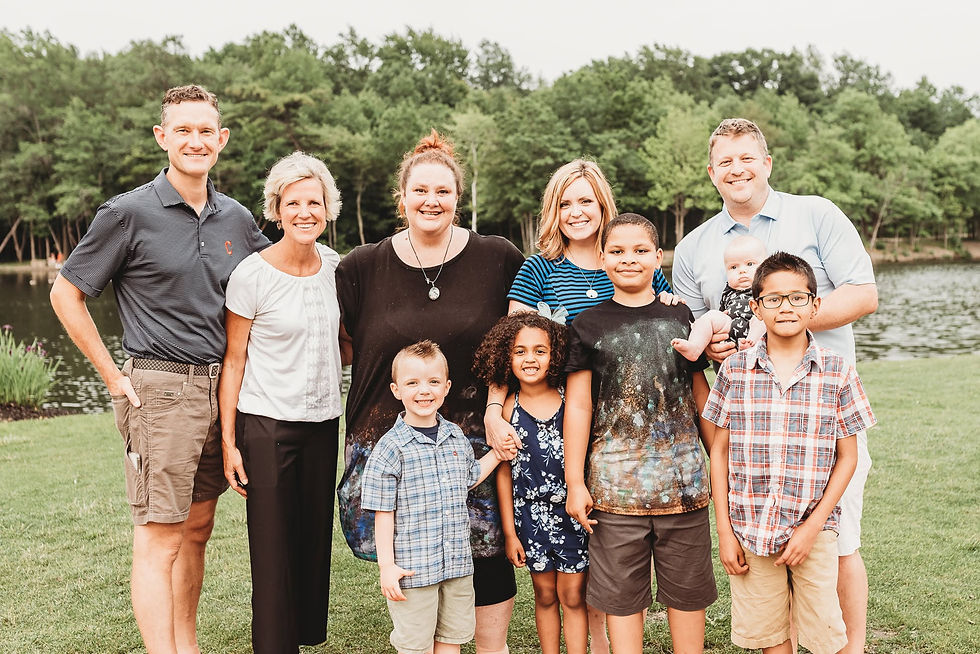 Our complete Cleveland Angels family surrounding us at our adoption party. Both our Mentor Seth, his wife and our Love Box family the Rashids.