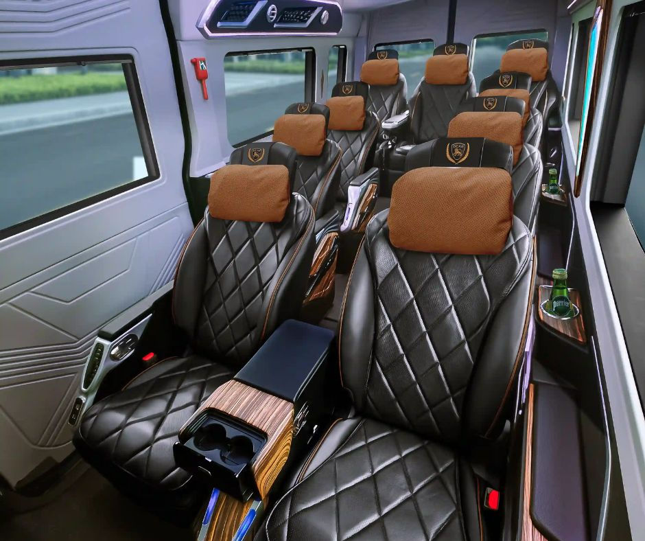 Close-up view of reclining seats inside a luxury limousine van