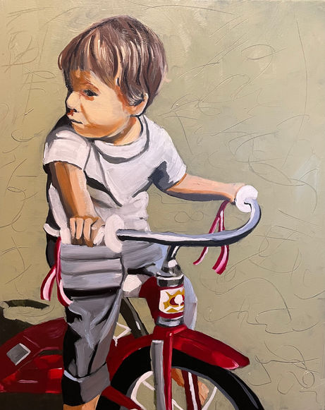 A little girl sits on a red tricycle.  She looks over her right shoulder away from the viewer.  She has a worried look on her face.