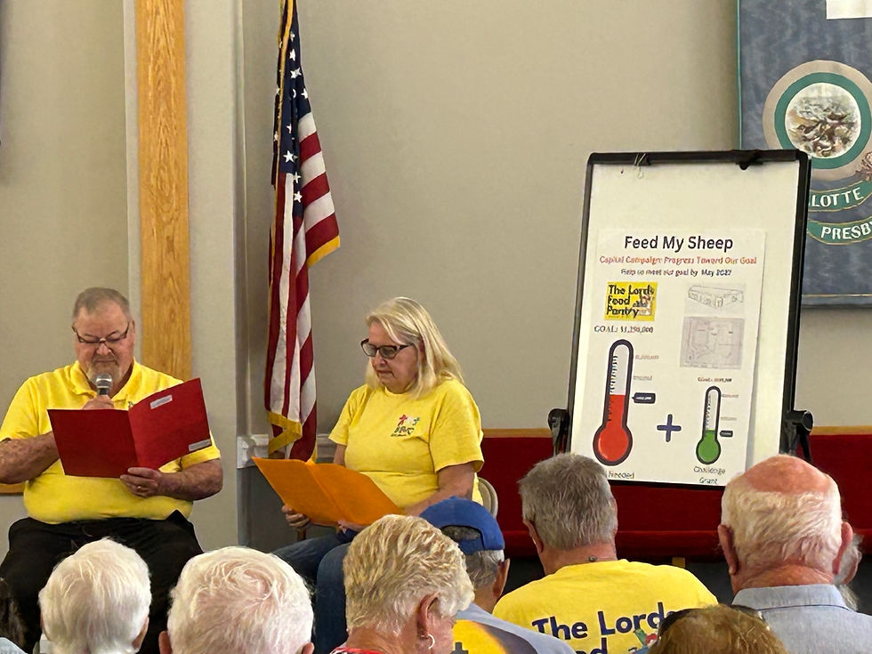 Mike and Deb Claxton engage the audience with a lively skit, illustrating the objectives of the capital campaign.