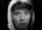 A woman looks scared