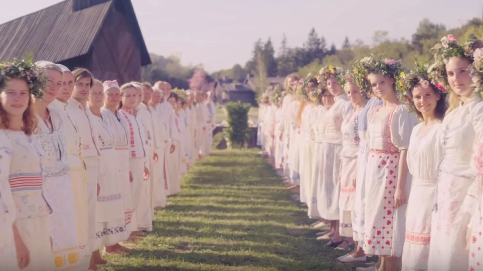 women line up in white dresses