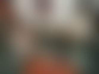 Two women sit and eat.