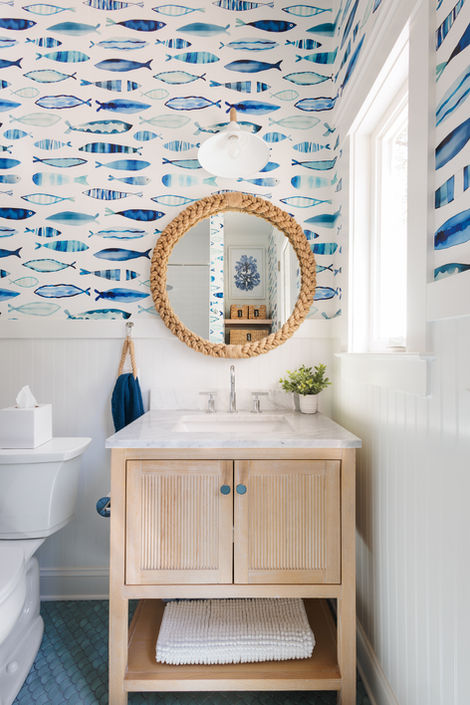 Pool house bathroom with wallpaper, rope mirror and white oak vanity.