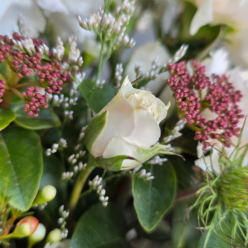 Corsages wrist $40, pin-on $30