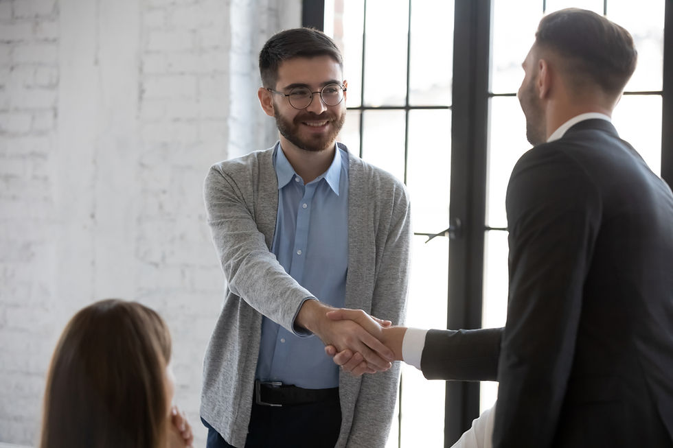 Tax attorney helping a client determine if they qualify for an IRS Offer in Compromise