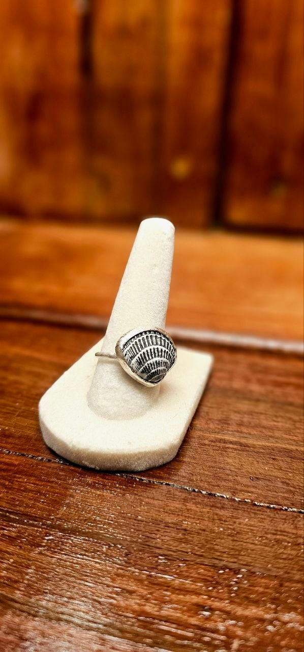 Shell inside of custom sterling silver bezel.