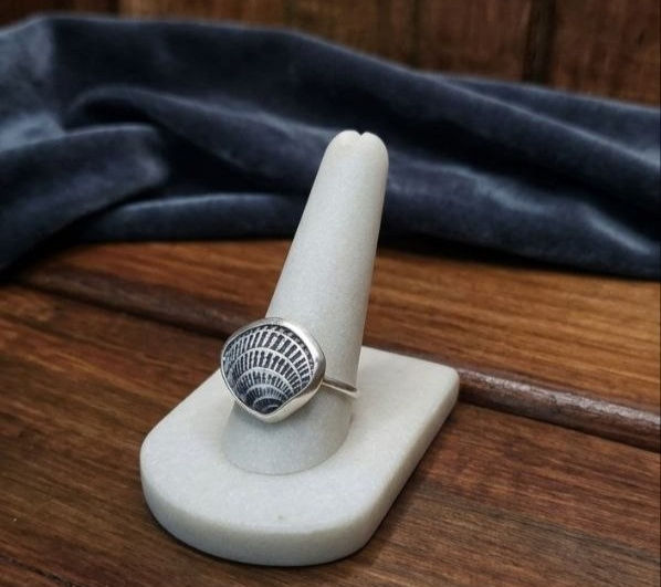 Shell inside of custom sterling silver bezel.