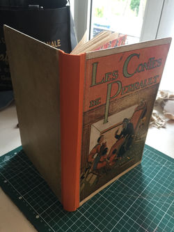 Restauration livre de contes