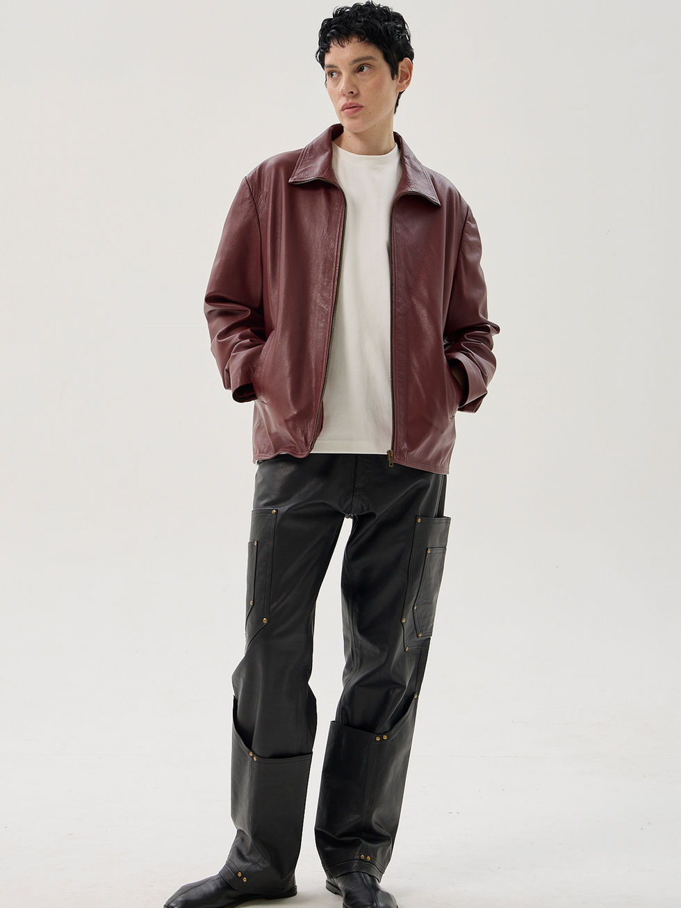 Burgundy sheepskin classic fit leather jacket with full zip front and vertical pockets