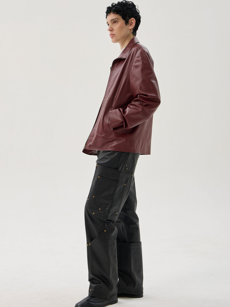 Burgundy sheepskin classic fit leather jacket with full zip front and vertical pockets