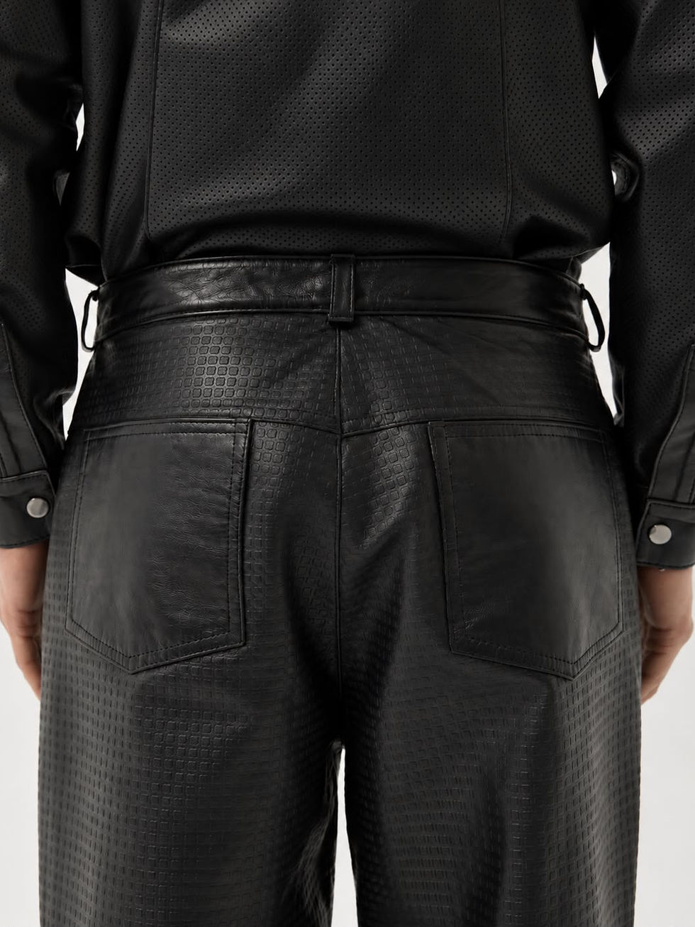 Black calfskin straight leg trousers with laser-cut detailing