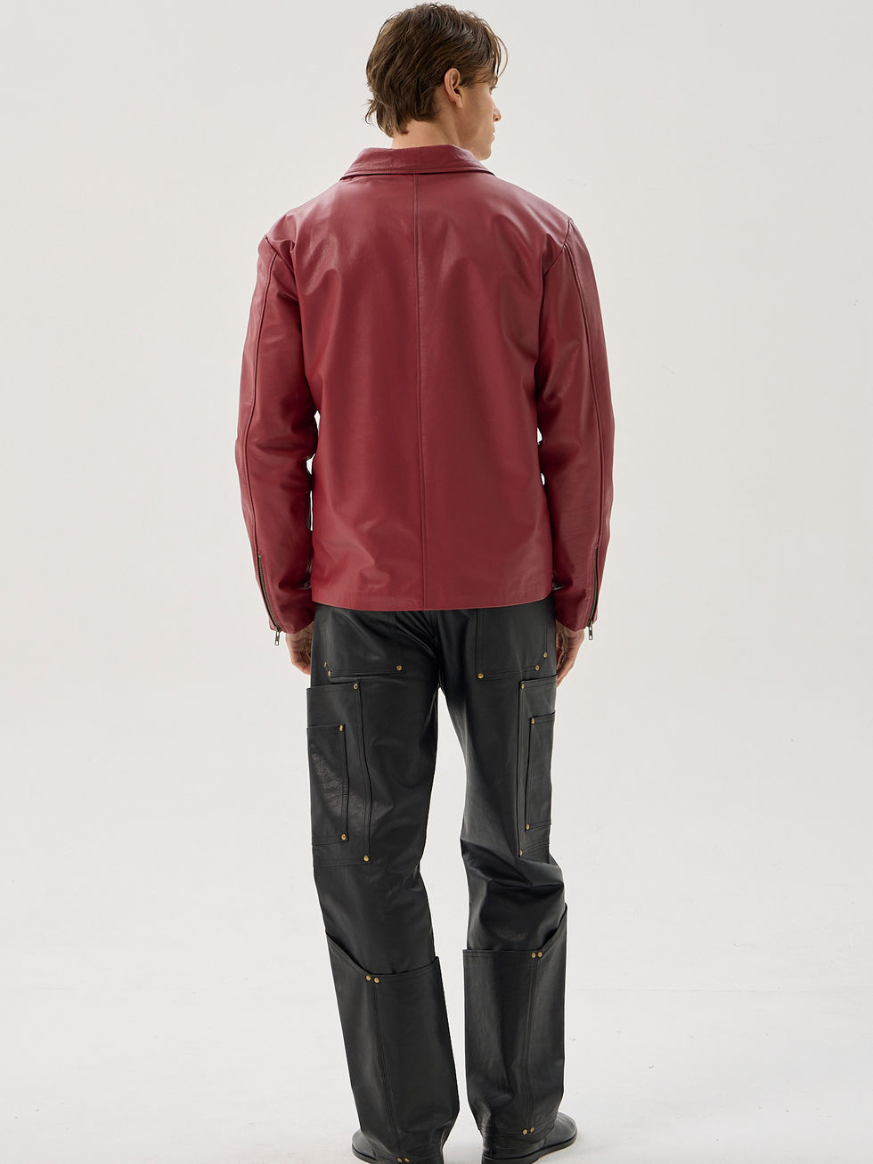 Red calfskin jacket with zip front, angled pockets and boxy fit