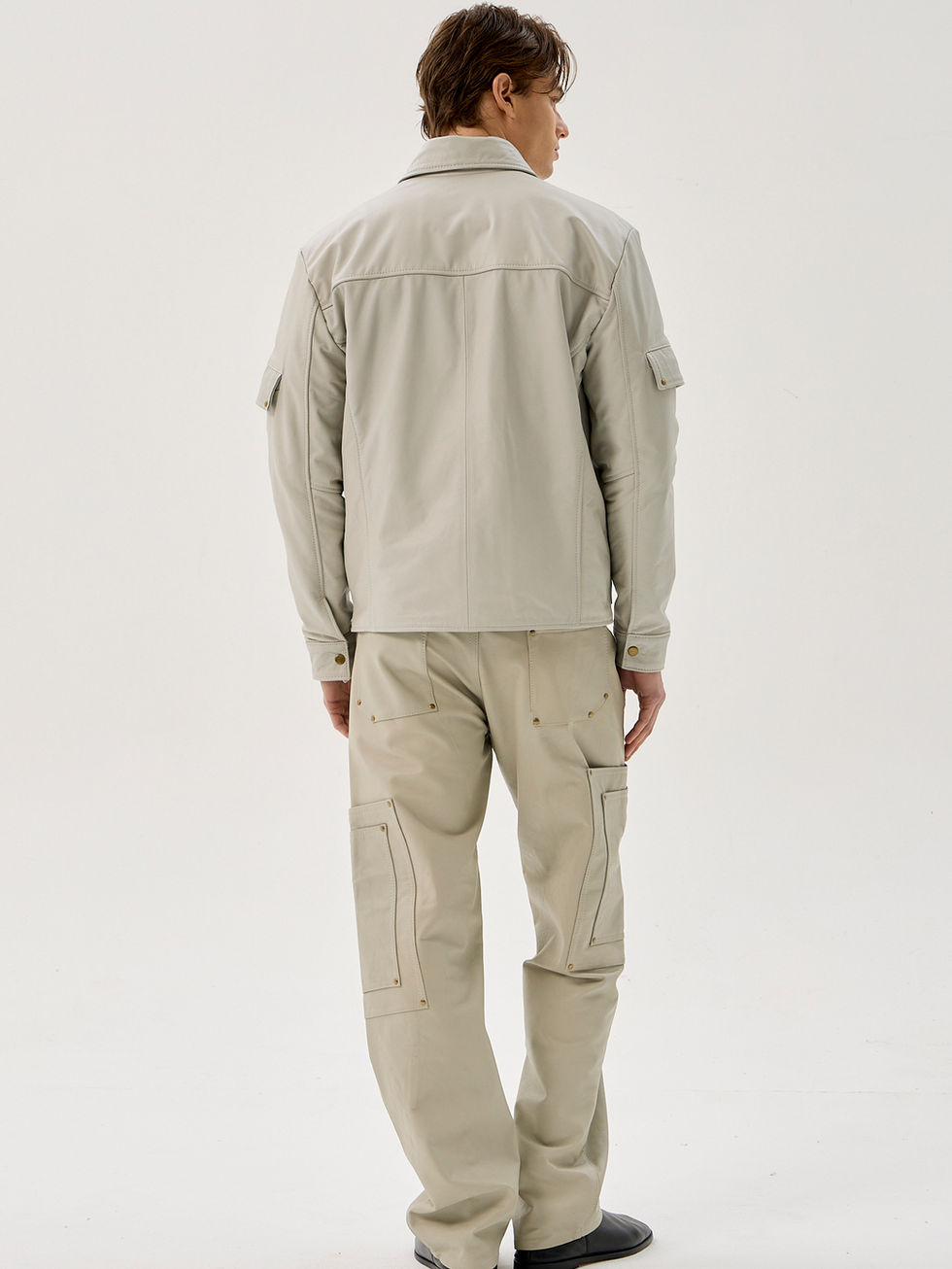 Bone white 100% calfskin jacket with 12 pockets and reinforced brass hardware