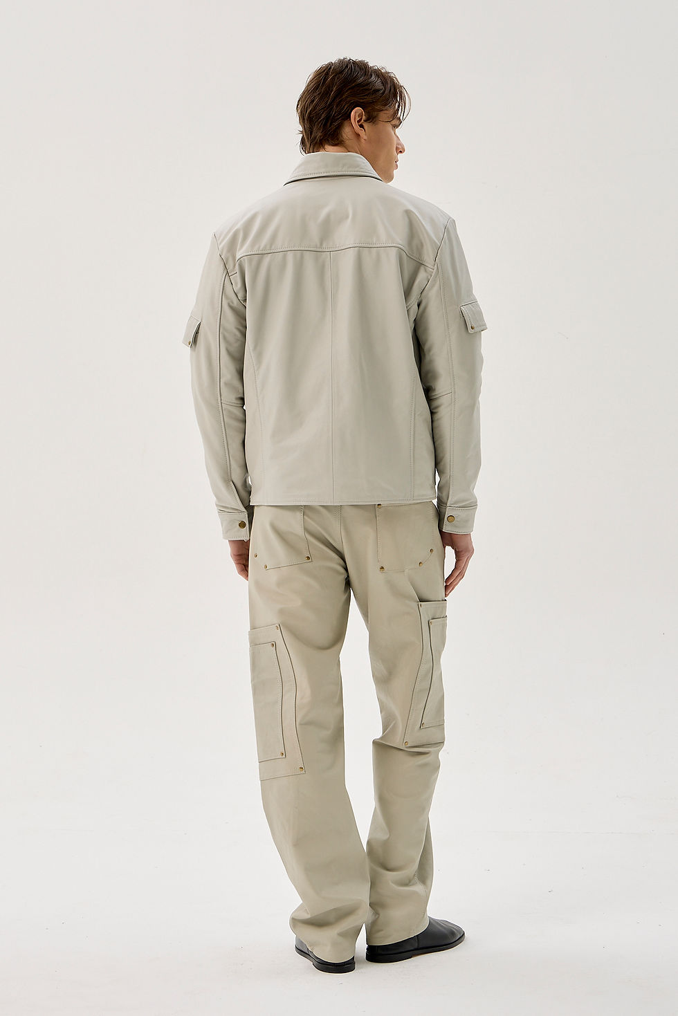 Bone white 100% calfskin jacket with 12 pockets and reinforced brass hardware