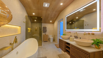 Spa bathroom with soaking tub and designer finishes in Delray Beach estate