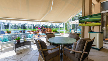 Expansive living area in West Palm Beach home captured by real estate photographer in West Palm Beach