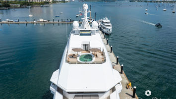 Stunning sunset view of a luxury yacht docked in Palm Beach, Florida, photographed by Edwin Figueroa Photography.