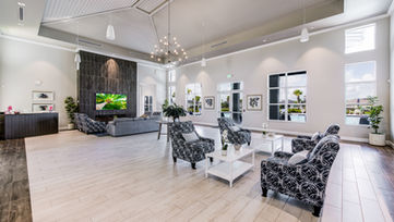 Luxury clubhouse lounge amenity with seating area in Port St. Lucie Florida photographed by Edwin Figueroa Photography