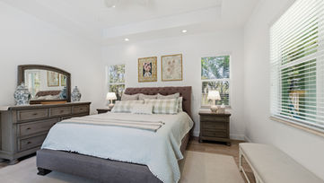 Guest bedroom in Boynton Beach Florida home photographed for real estate marketing