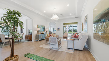 Spacious great room with abundant natural light in a Port St. Lucie waterfront home.