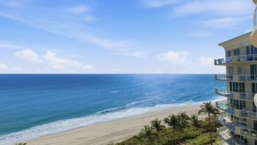 High-end real estate photography of ocean view condo balcony on Hillsboro Mile Ocean Drive